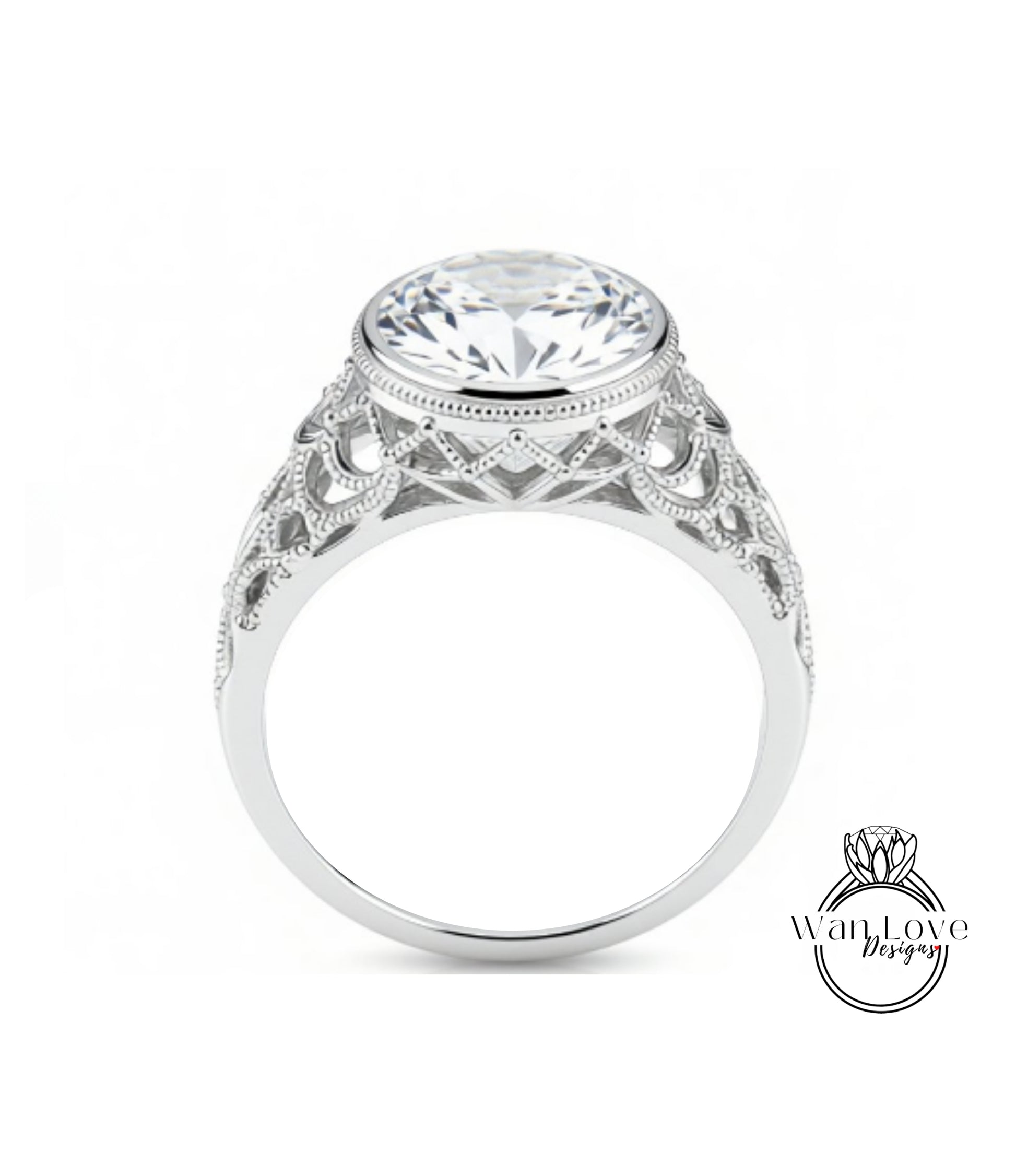 A close-up of a silver ring with a large, round diamond at the center, showcasing the intricate design and craftsmanship of the piece.
