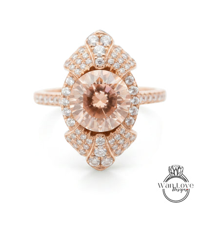a beautiful rose gold ring with a large, round, light pink gemstone at the center. The ring is adorned with numerous small diamonds around the edges, creating a stunning and elegant design.