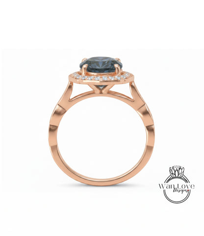 A rose gold ring with a large blue gemstone set in the center, surrounded by smaller diamonds.