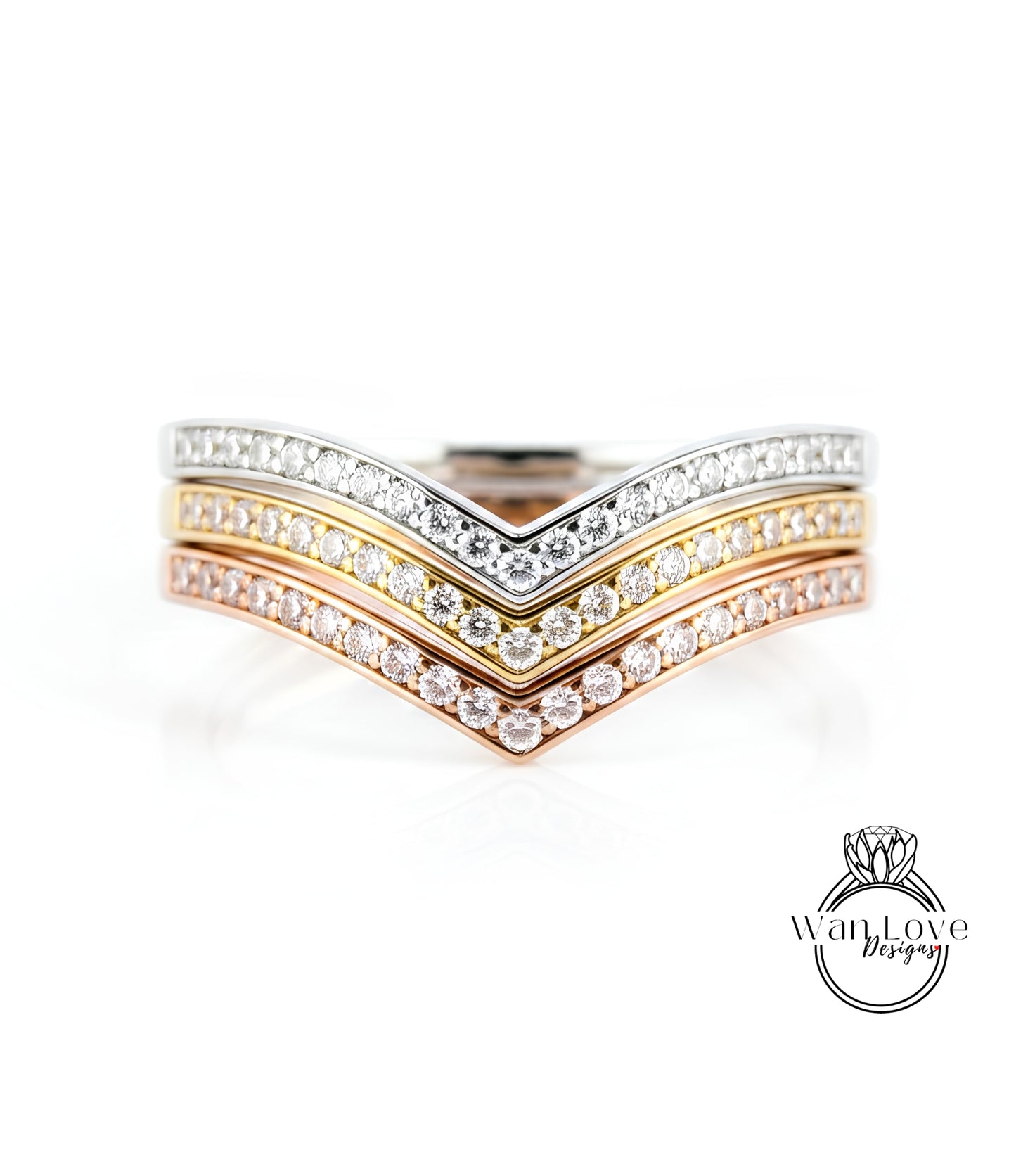 A close-up image of a ring with three layers of diamond-encrusted bands, showcasing the intricate design and craftsmanship of the jewelry piece.