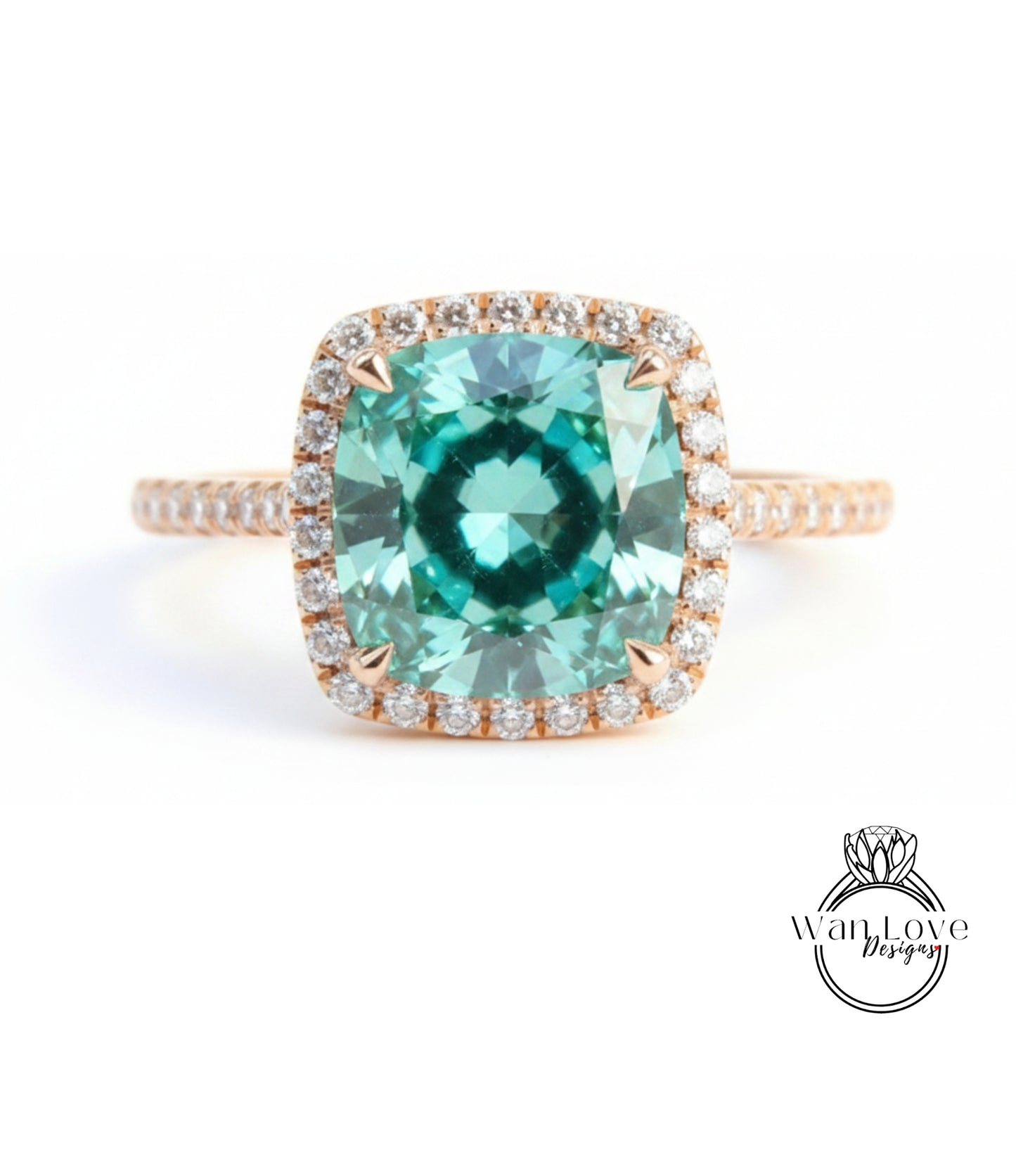 A stunning ring featuring a large, square-cut green gemstone surrounded by a halo of smaller diamonds set in a gold band.