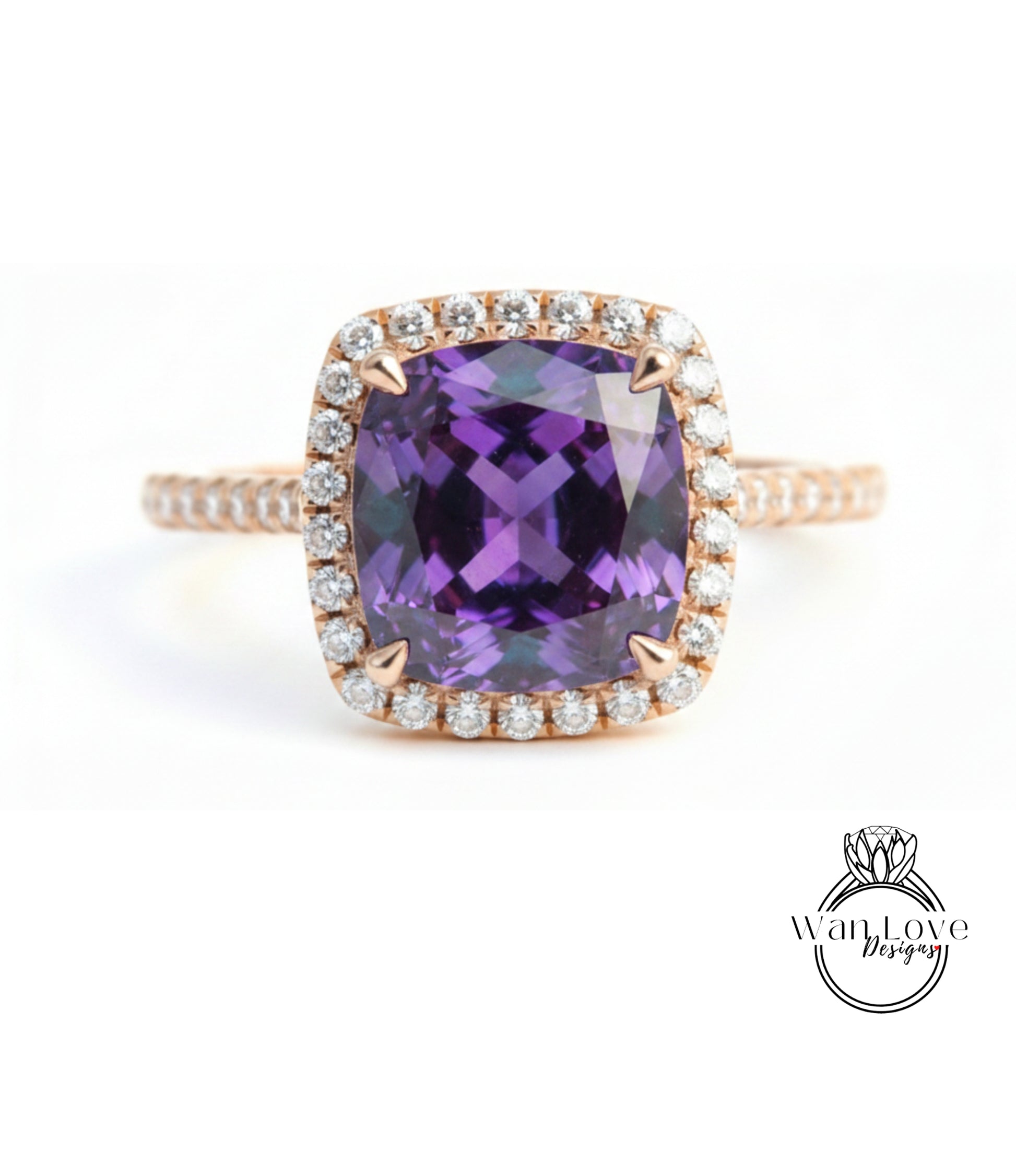 a beautiful ring with a large purple gemstone set in a halo of smaller diamonds.
