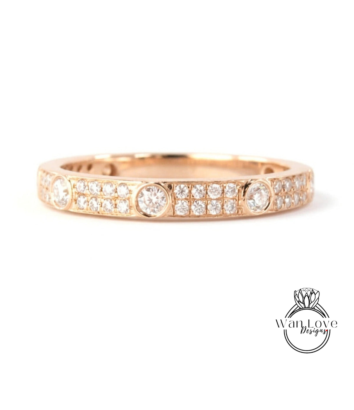A gold ring with a row of small diamonds set in the band.