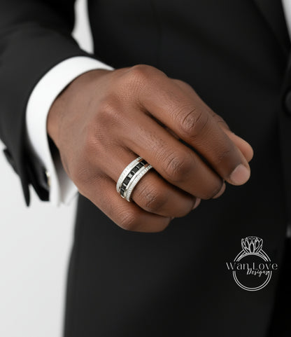 A close-up of a person's hand wearing a ring on the ring finger.