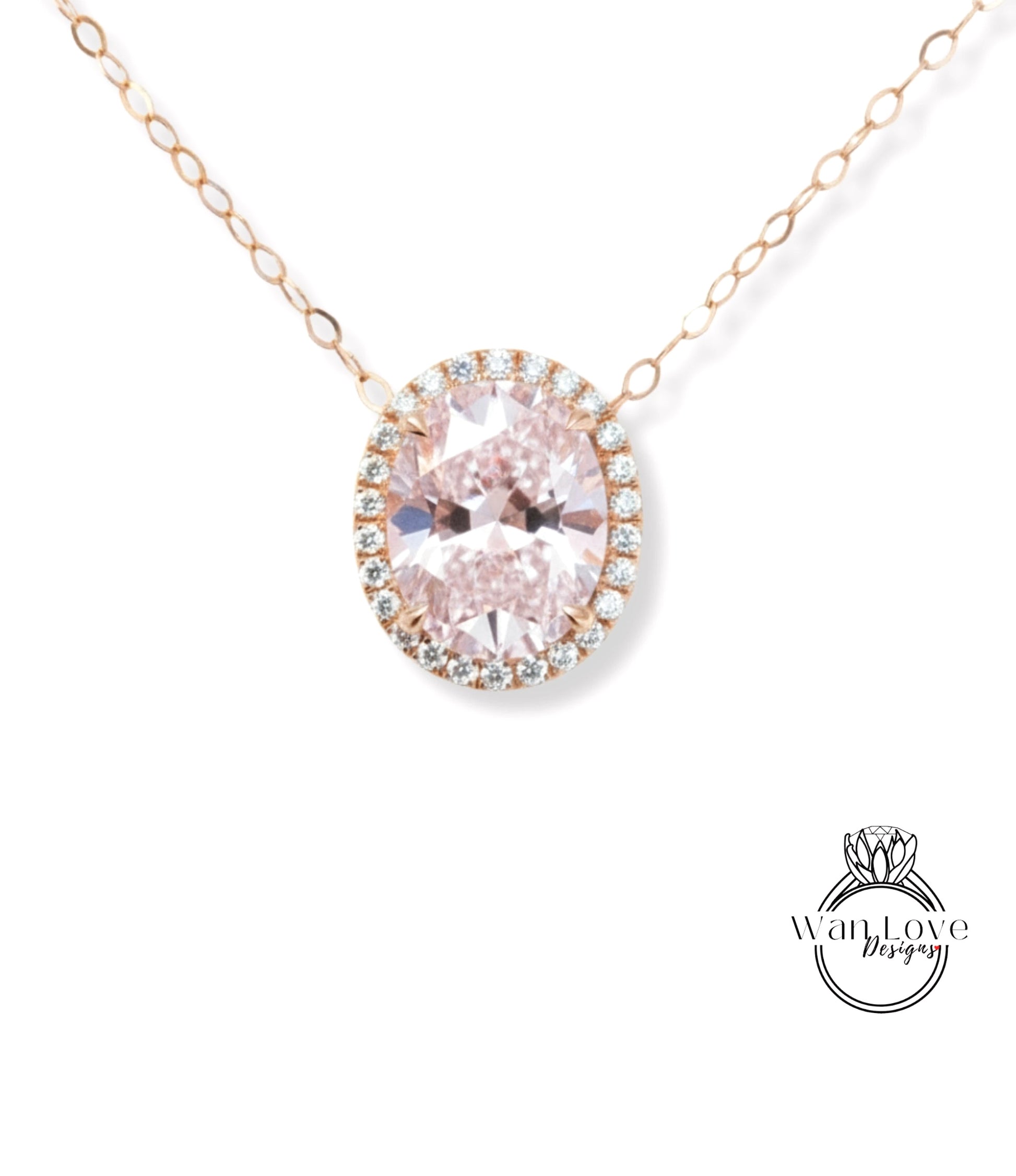 A necklace with a large oval-shaped gemstone, possibly a diamond, surrounded by smaller diamonds and set in a halo of smaller diamonds.