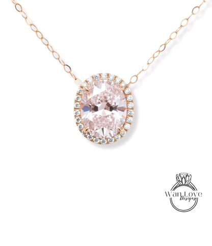 A necklace with a large oval-shaped gemstone, possibly a diamond, surrounded by smaller diamonds and set in a halo of smaller diamonds.