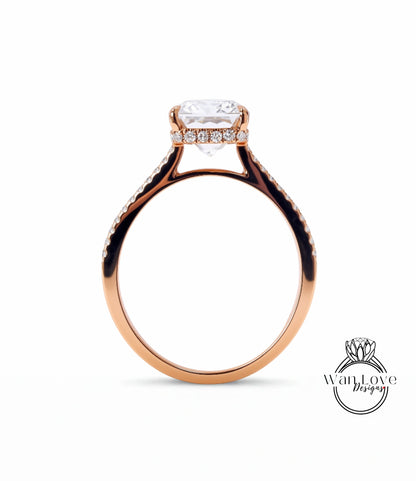 A gold ring with a large diamond set in the center, showcasing the intricate design and craftsmanship of the piece.