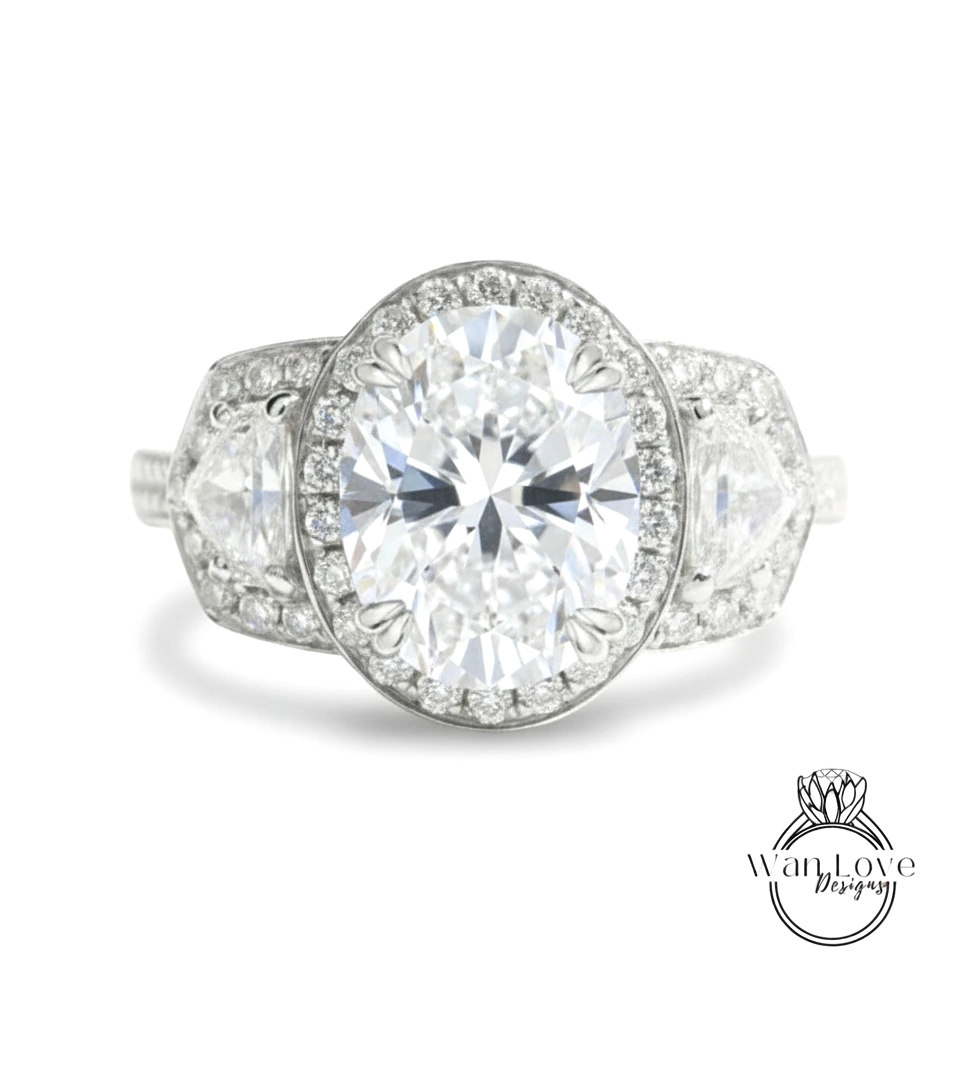 A stunning diamond engagement ring with a large oval-shaped diamond at the center, surrounded by smaller diamonds and set in a halo of smaller diamonds.