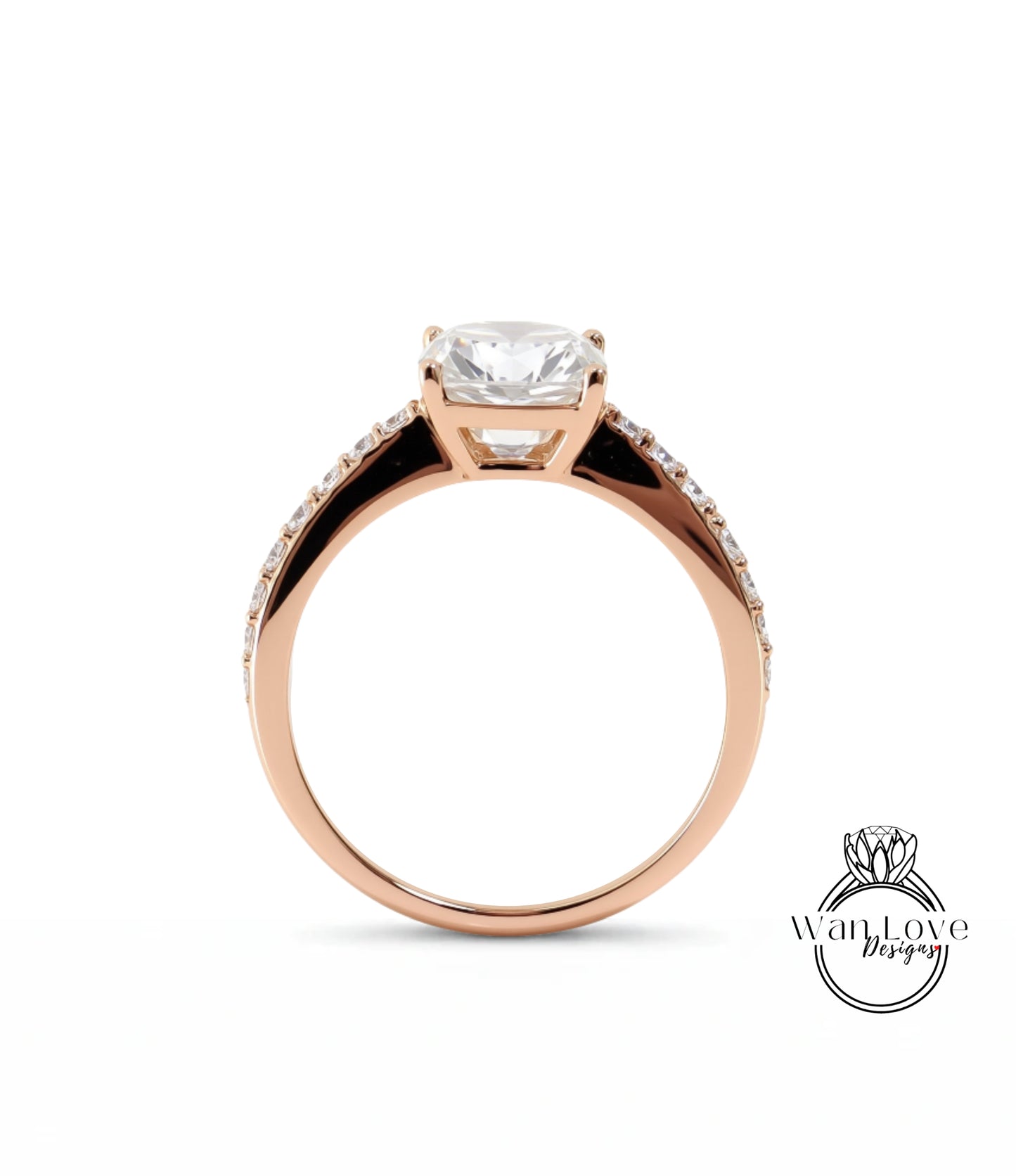 A rose gold engagement ring with a large central diamond and smaller diamonds along the band.