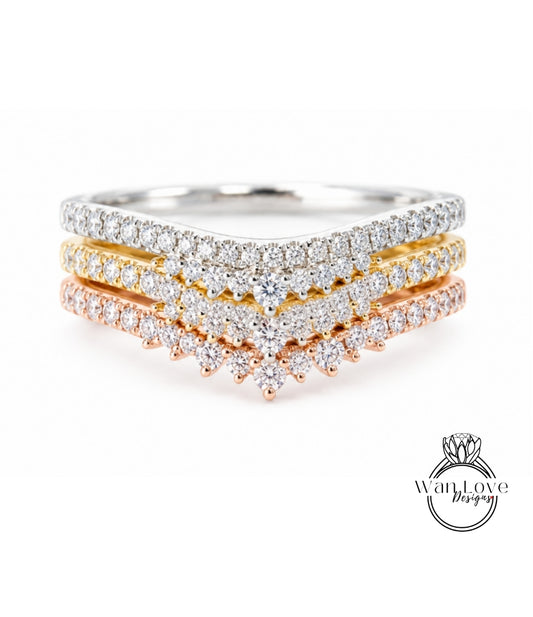 A close-up view of a diamond ring with multiple tiers of diamond bands, showcasing the intricate design and sparkling diamonds.