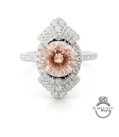 A stunning engagement ring with a large, round, peach-colored gemstone set in a sparkling diamond-encrusted band.