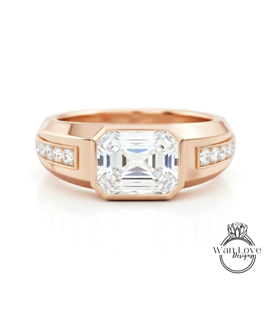 a large, clear diamond engagement ring with a gold band and multiple small diamonds set in the band.