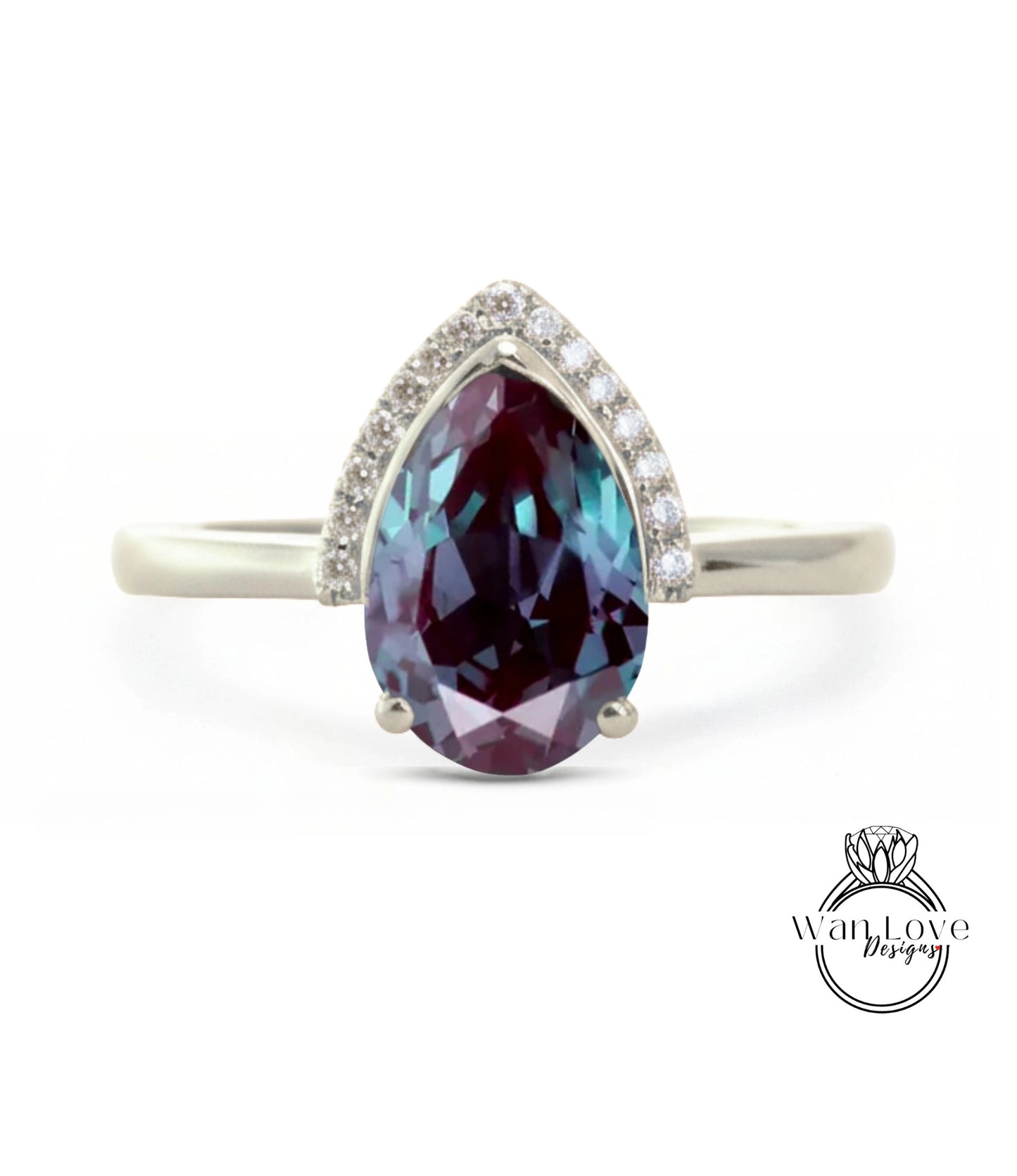A silver ring with a large, deep purple gemstone at the center, surrounded by smaller diamonds.