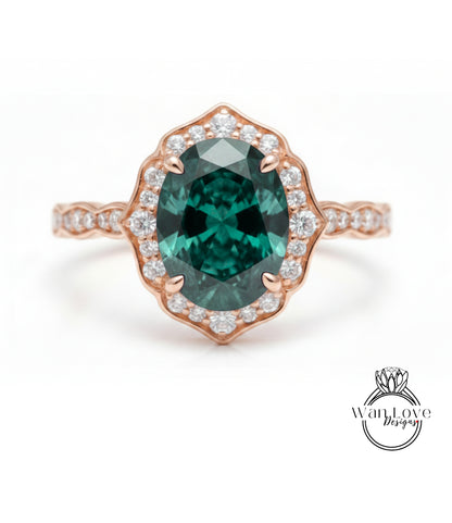 a beautiful engagement ring with a large oval-shaped gemstone set in a halo of smaller diamonds.