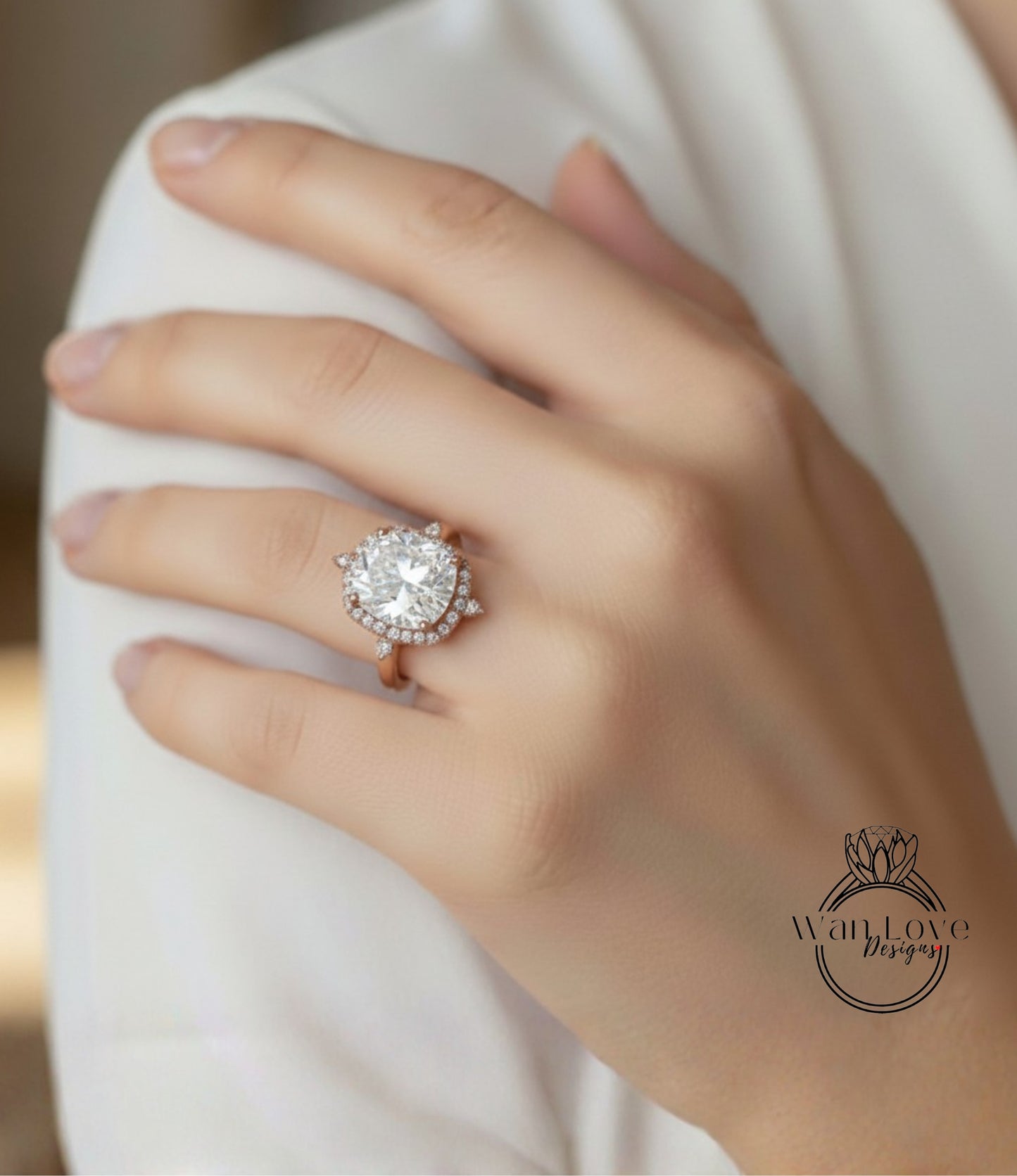 A close-up of a person's hand wearing a large, sparkling diamond ring on the ring finger.