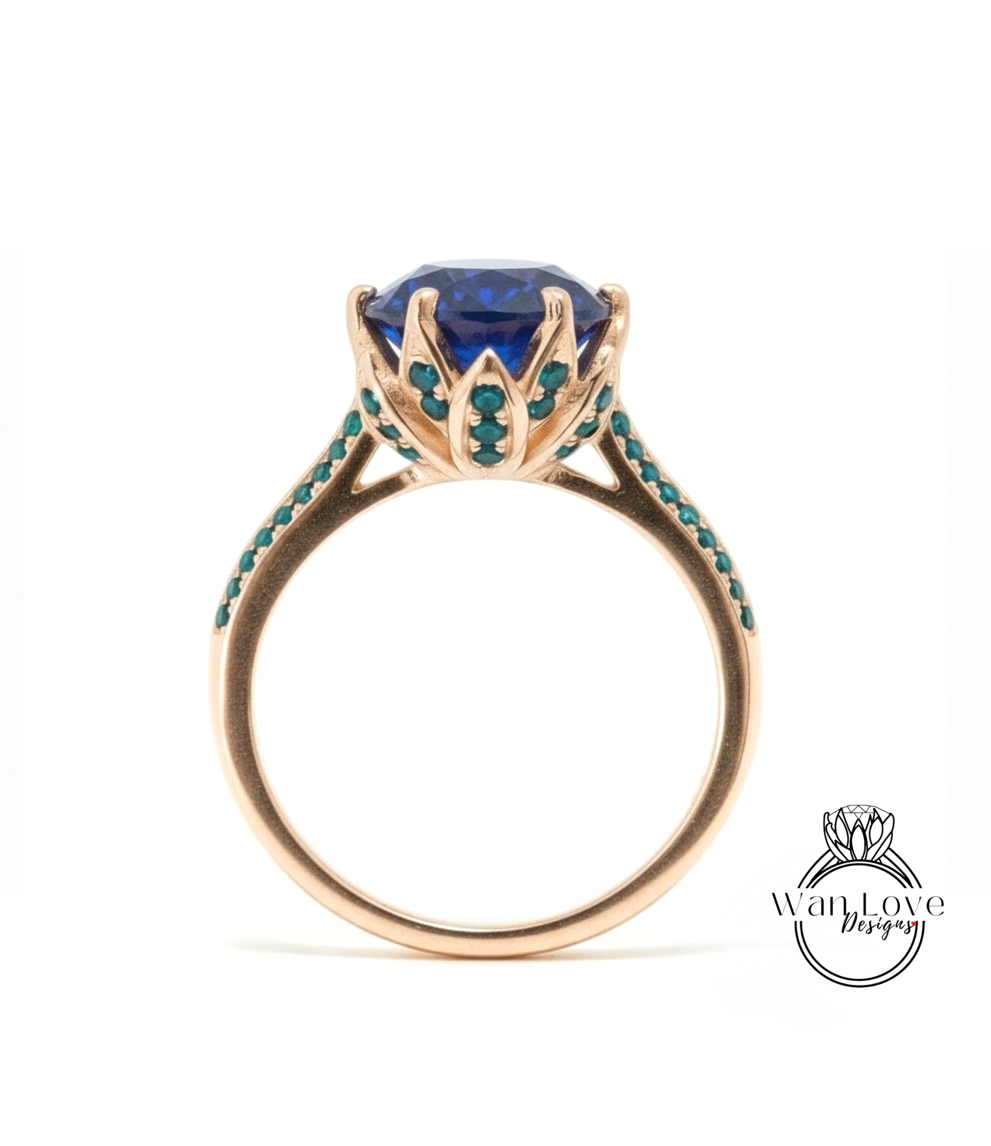 A gold ring with a large blue gemstone at the center, surrounded by small green stones.