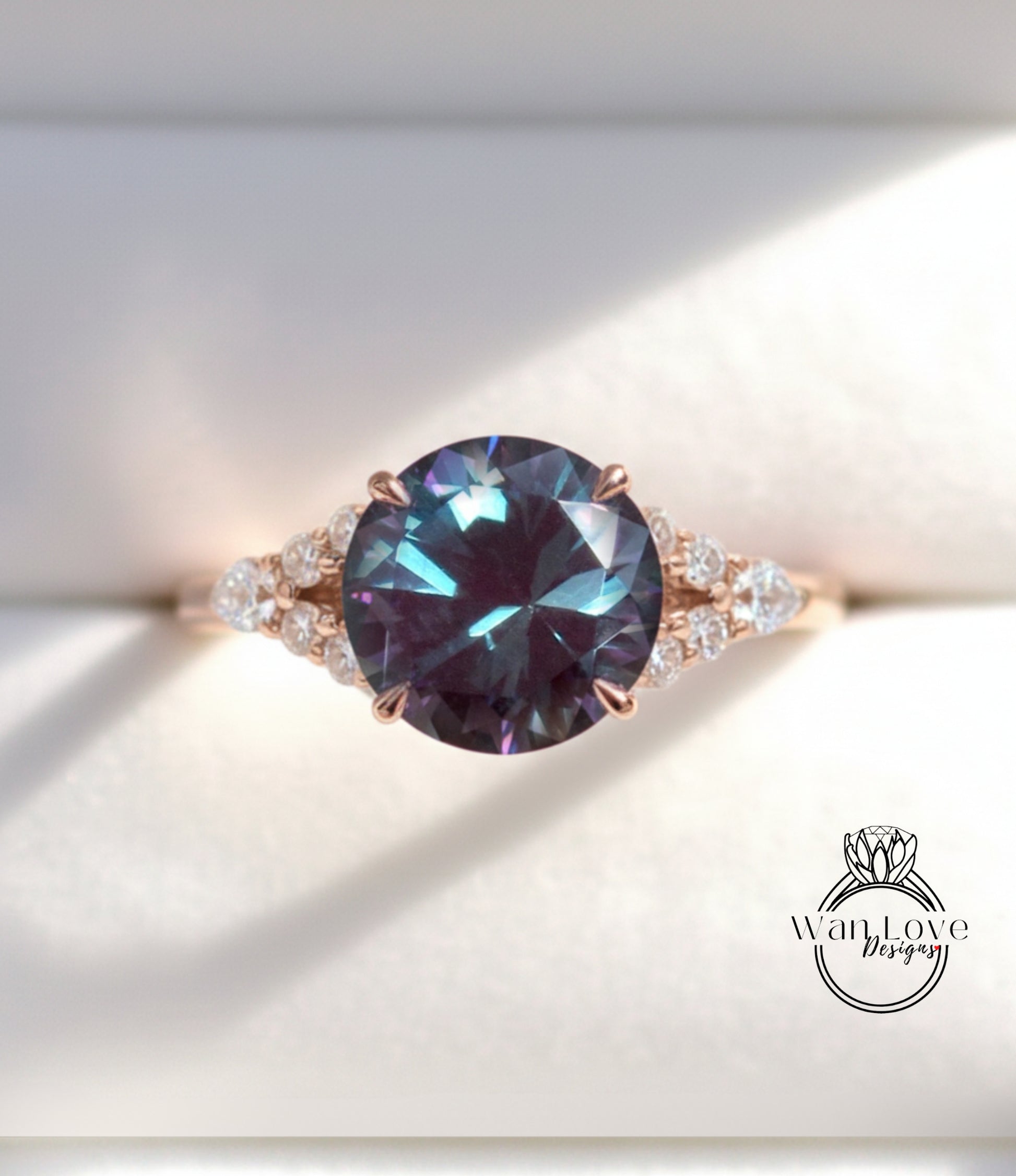 A close-up image of a gold ring with a large blue gemstone, showcasing the intricate details and craftsmanship of the jewelry.