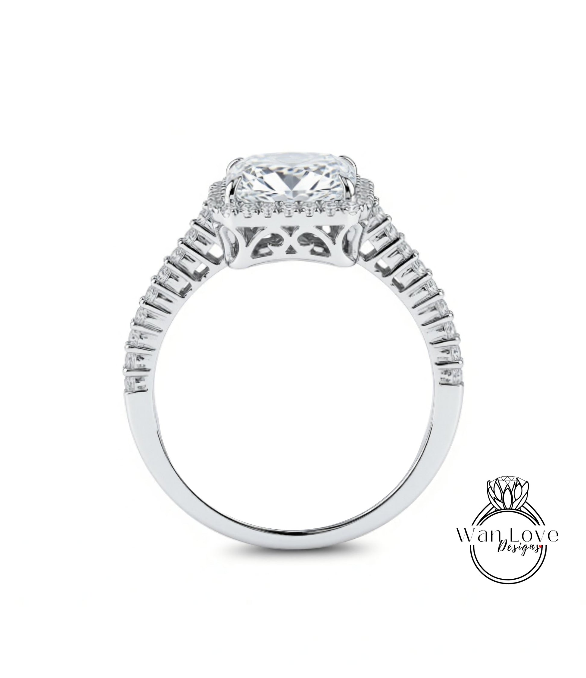 A close-up view of a diamond engagement ring with a large central diamond surrounded by smaller diamonds set in a halo.