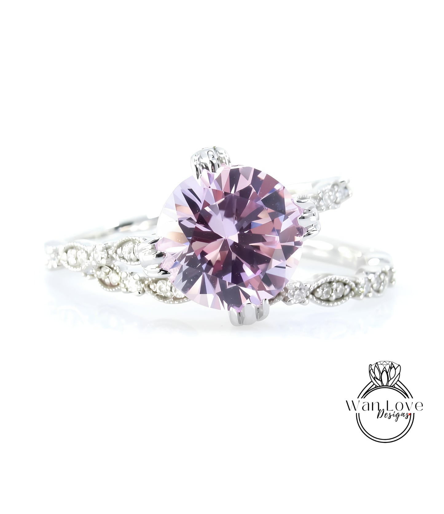 A close-up image of a beautiful pink diamond ring with a large central diamond surrounded by smaller diamonds and a delicate band.