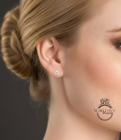 A close-up of a woman's face, focusing on her ear with a diamond earring.