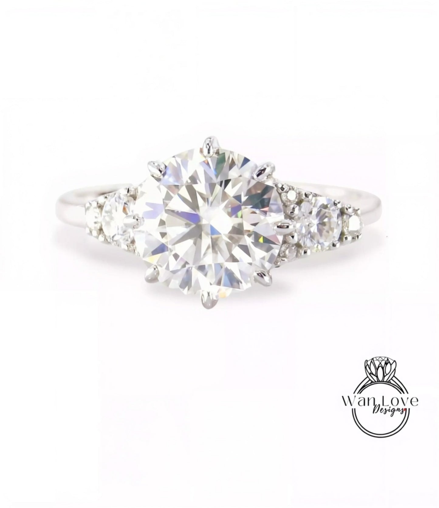 A close-up view of a diamond engagement ring with a large, brilliant-cut diamond set in a silver band.