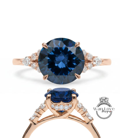 a beautiful blue gemstone ring with a gold band and a row of small diamonds set in the band.