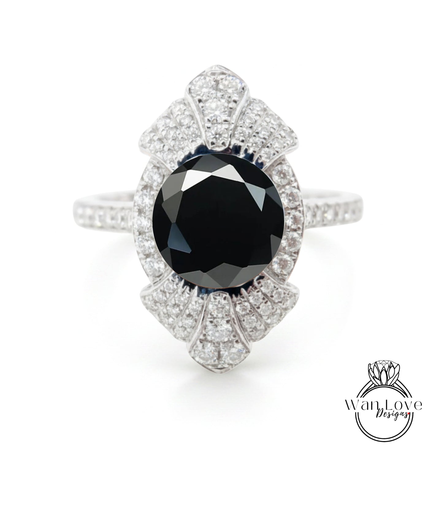 A stunning diamond ring with a large black gemstone at its center, surrounded by a sparkling array of diamonds.