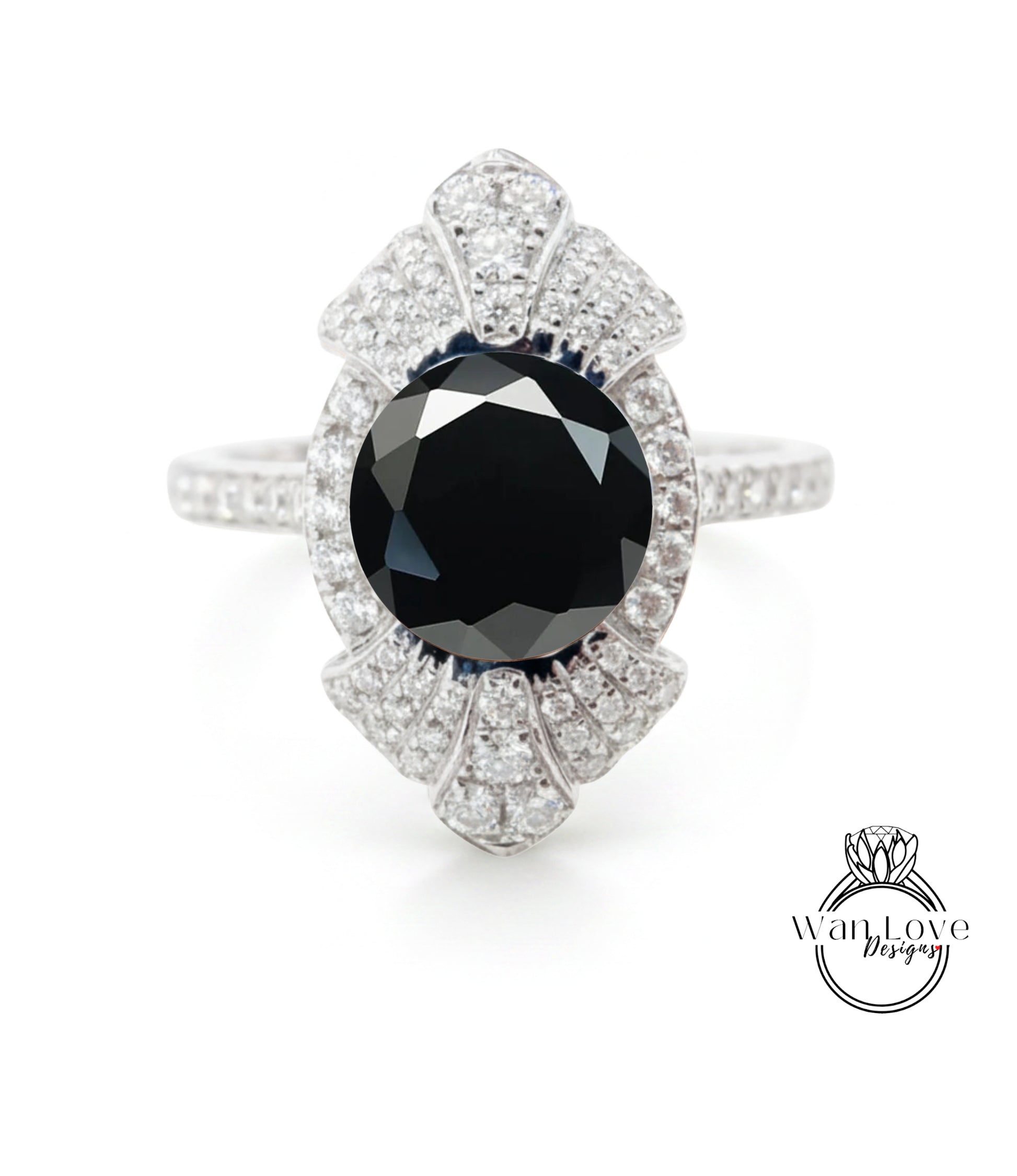 A stunning diamond ring with a large black gemstone at its center, surrounded by a sparkling array of diamonds.