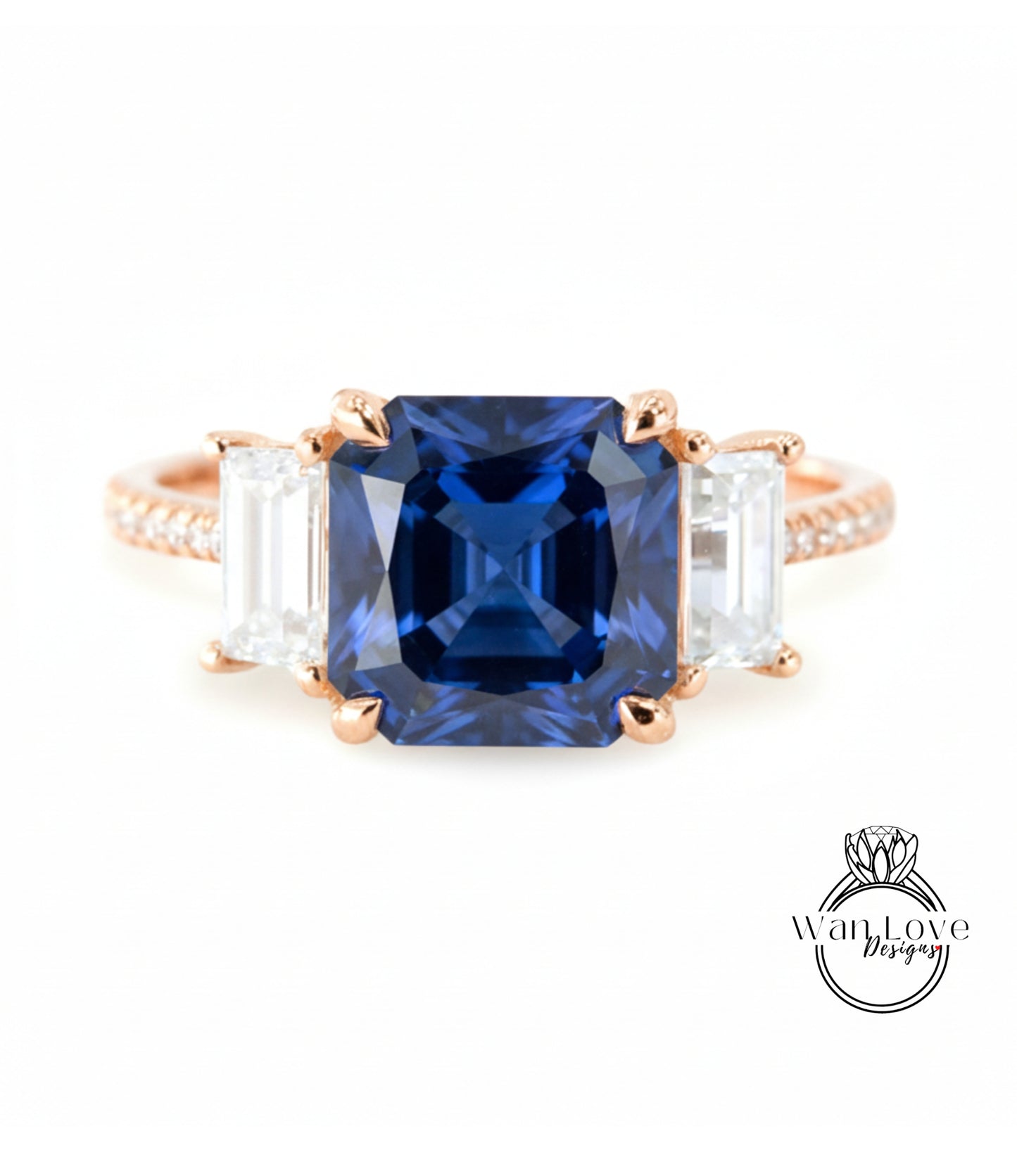 A close-up of a gold ring with a large blue gemstone in the center, surrounded by smaller white gemstones.