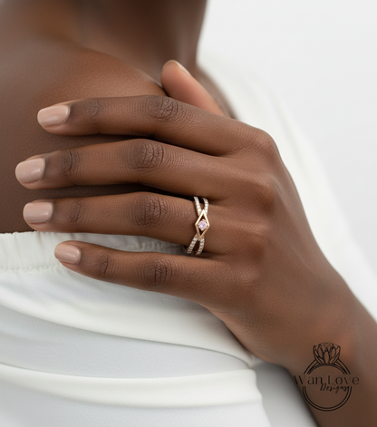 A close-up of a person's hand wearing a gold ring with a diamond.