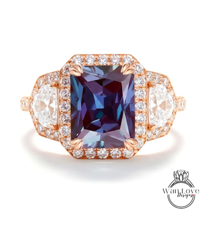 A stunning ring featuring a large, deep blue gemstone surrounded by a halo of smaller diamonds, set in a gold-toned metal band.
