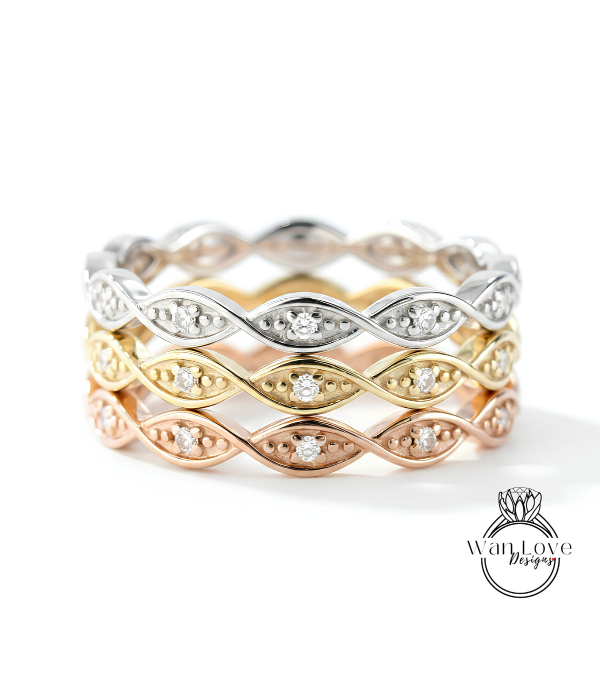 A ring with multiple layers of rings, each with a diamond set in the center. The rings are arranged in a circular pattern, creating a layered design.
