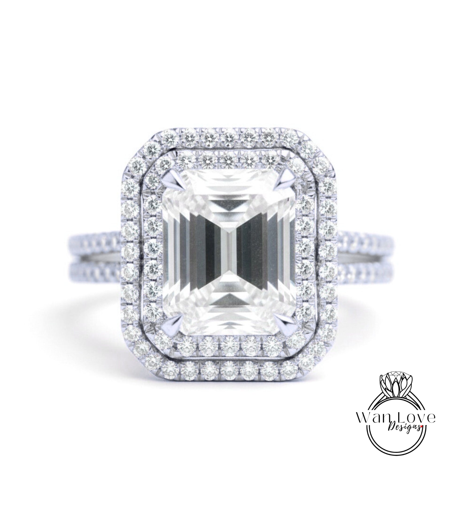 A stunning diamond engagement ring with a large, brilliant-cut diamond set in a halo of smaller diamonds, surrounded by a halo of smaller diamonds.