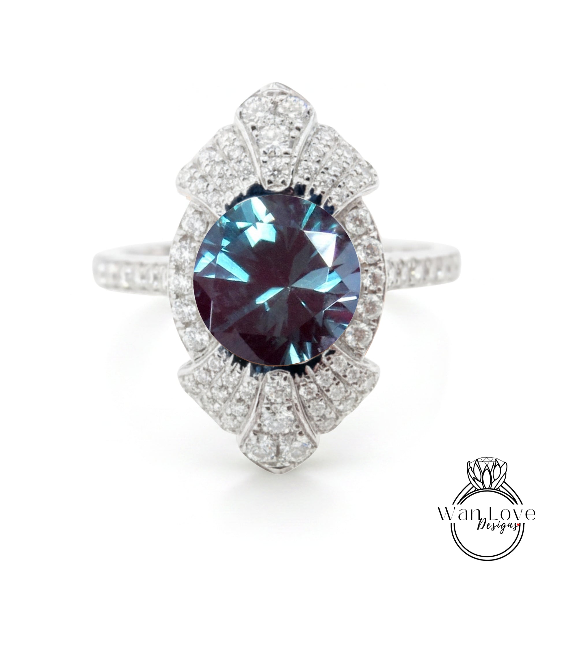 A stunning diamond ring with a large blue gemstone set in a silver band, surrounded by smaller diamonds.