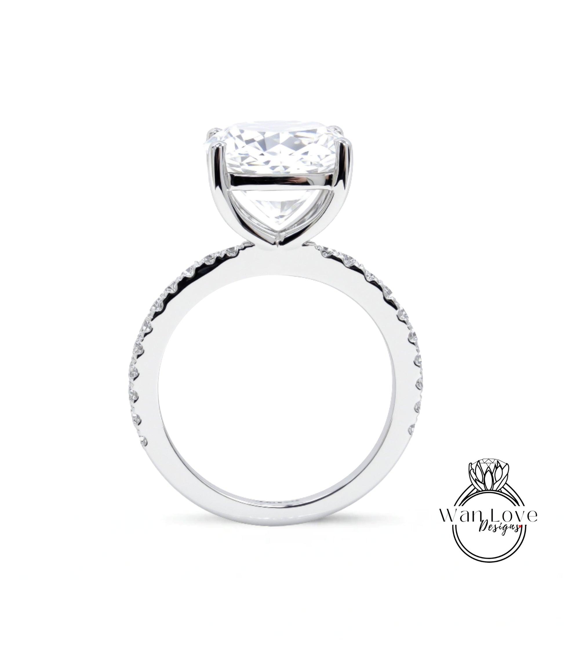 A large, clear diamond engagement ring with a large central diamond and a smaller diamond band around the base.