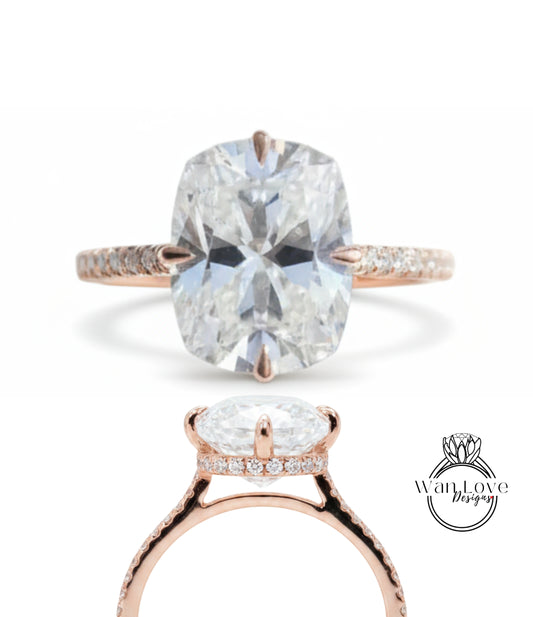 a large, clear diamond engagement ring with a rose gold band and a central pavé gemstone.