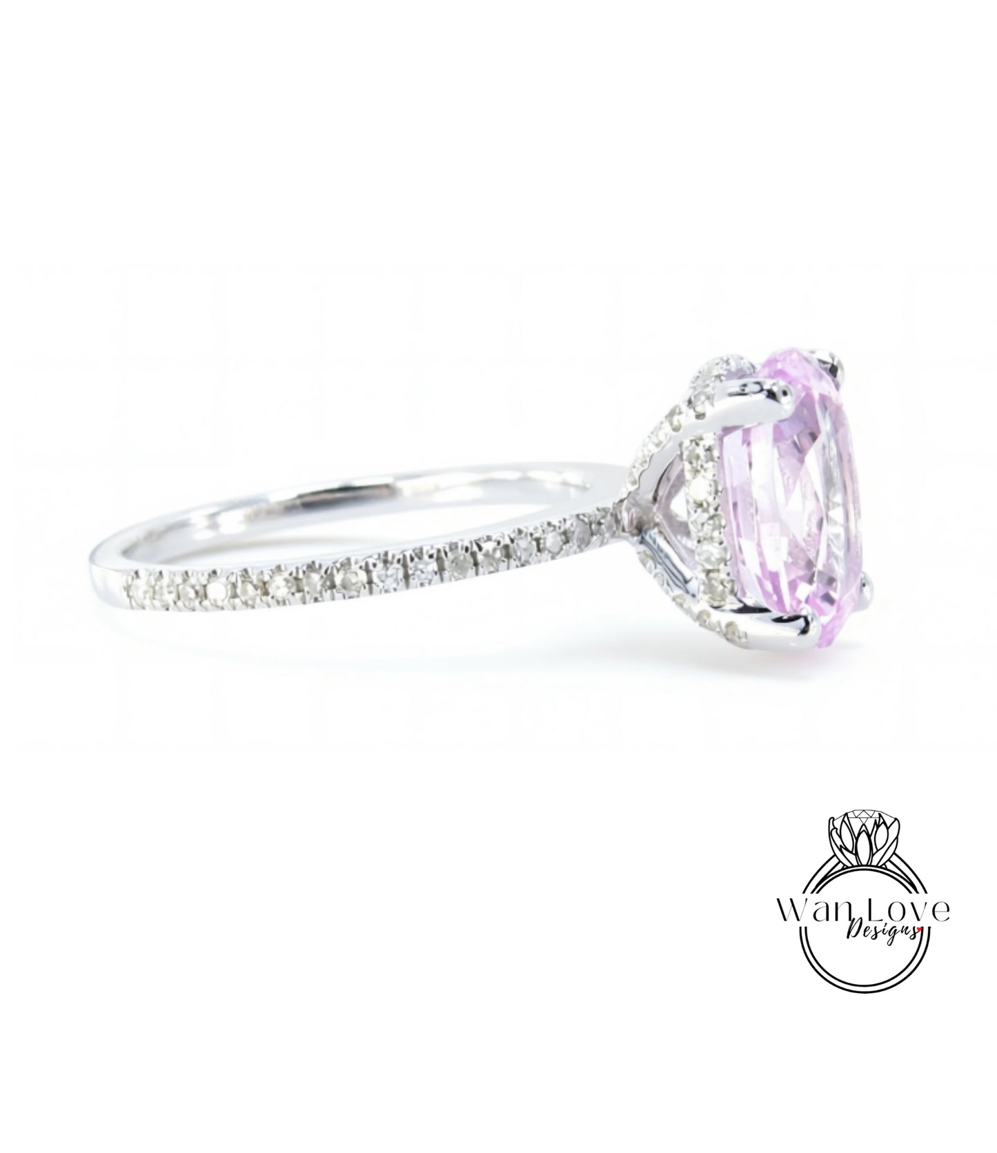 A close-up view of a diamond engagement ring with a large oval-shaped gemstone set in a silver band.
