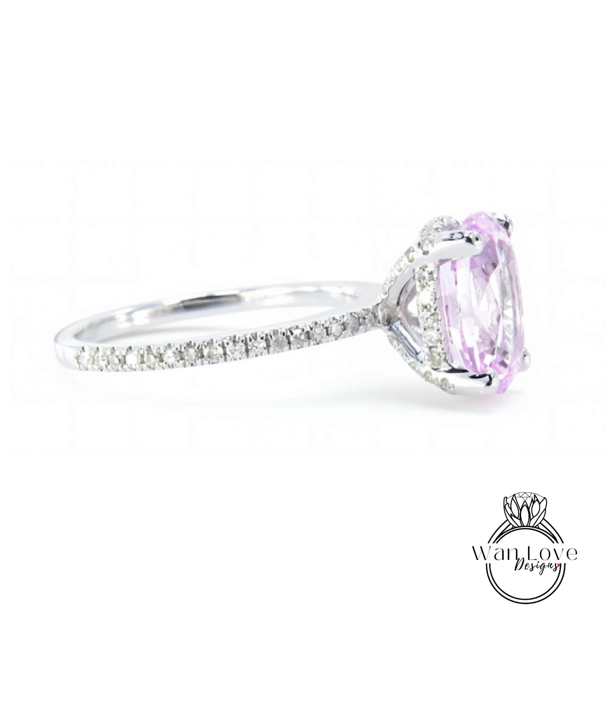 A close-up view of a diamond engagement ring with a large oval-shaped gemstone set in a silver band.