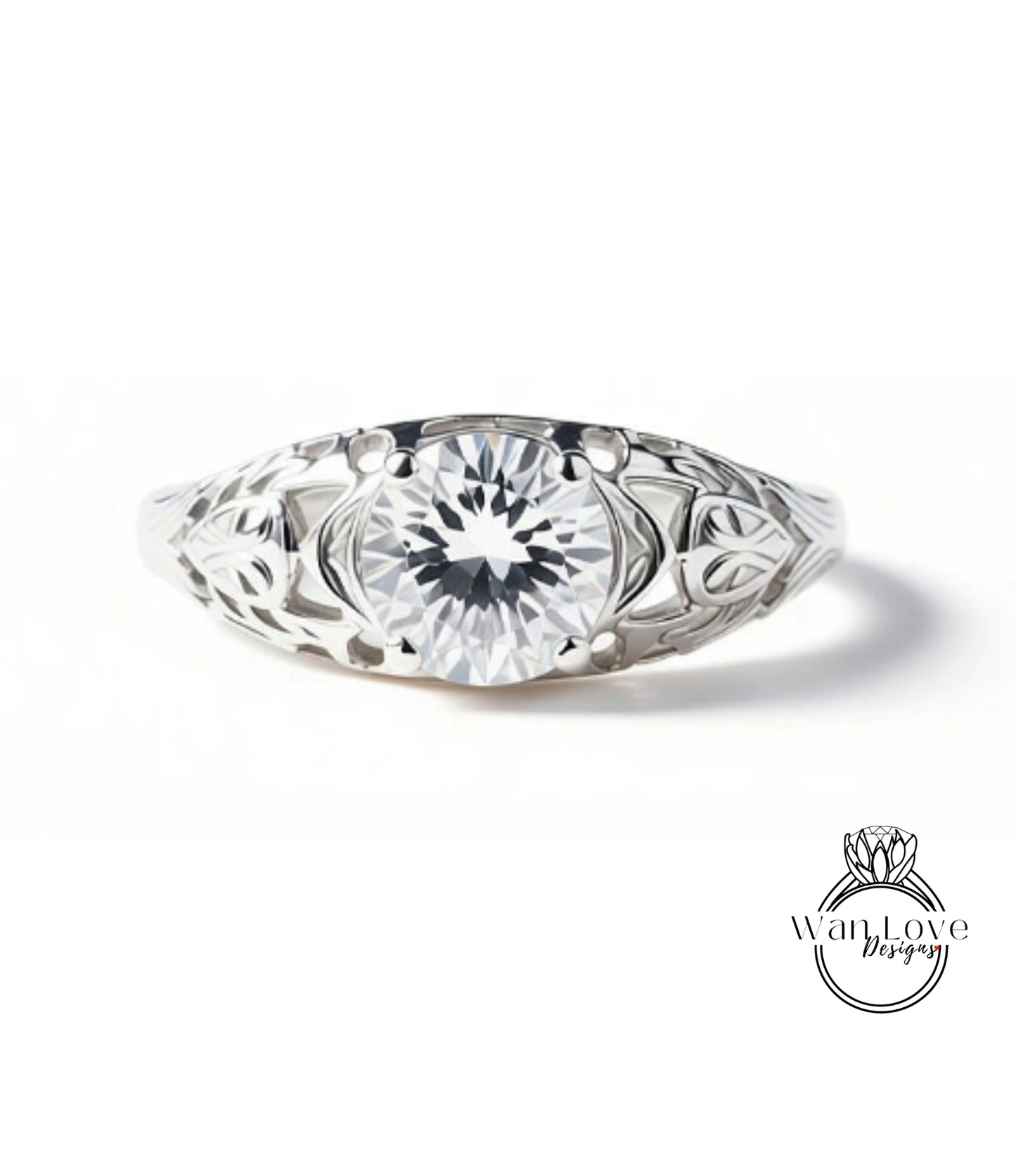 A close-up view of a silver ring with a large, clear gemstone set in the center.