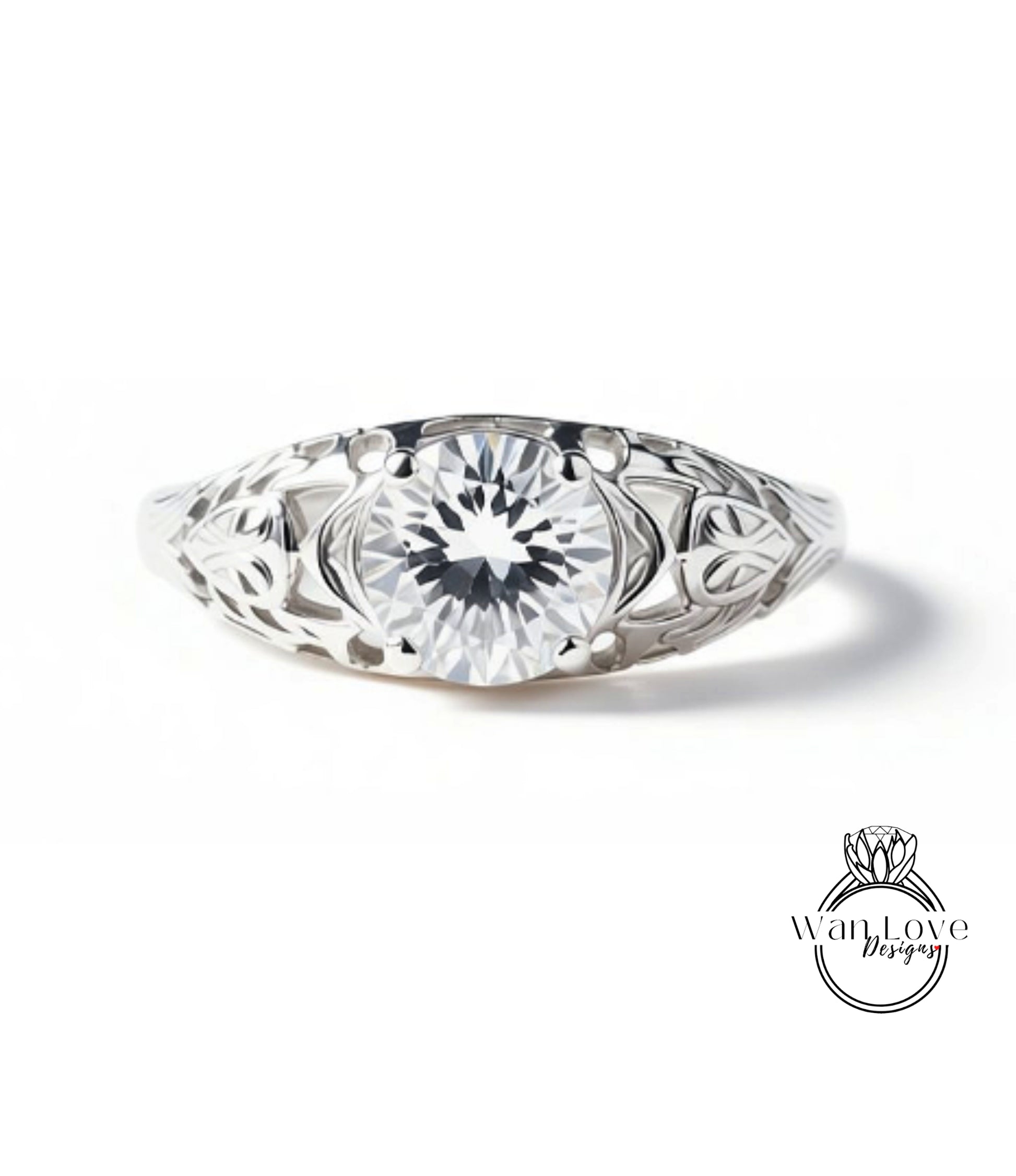 A close-up view of a silver ring with a large, clear gemstone set in the center.