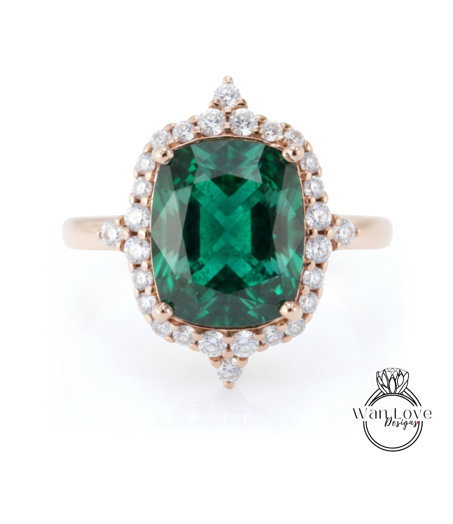 A large, oval-shaped green gemstone set in a gold ring with a halo of smaller diamonds around it.