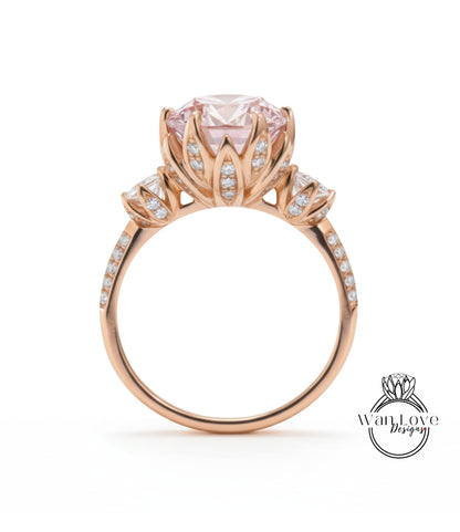 A beautiful rose gold engagement ring with a large pink gemstone set in a delicate flower-like design.