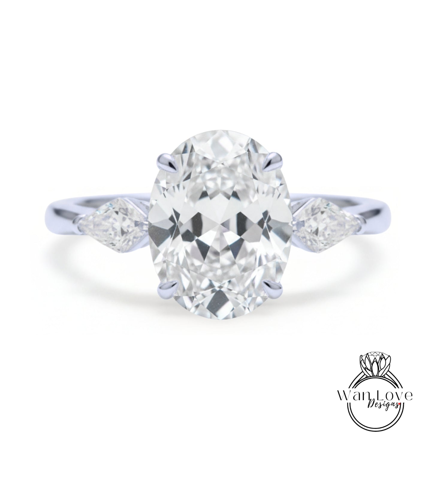 A close-up of a diamond engagement ring with a large oval-shaped diamond set in the center, surrounded by smaller diamonds on either side.