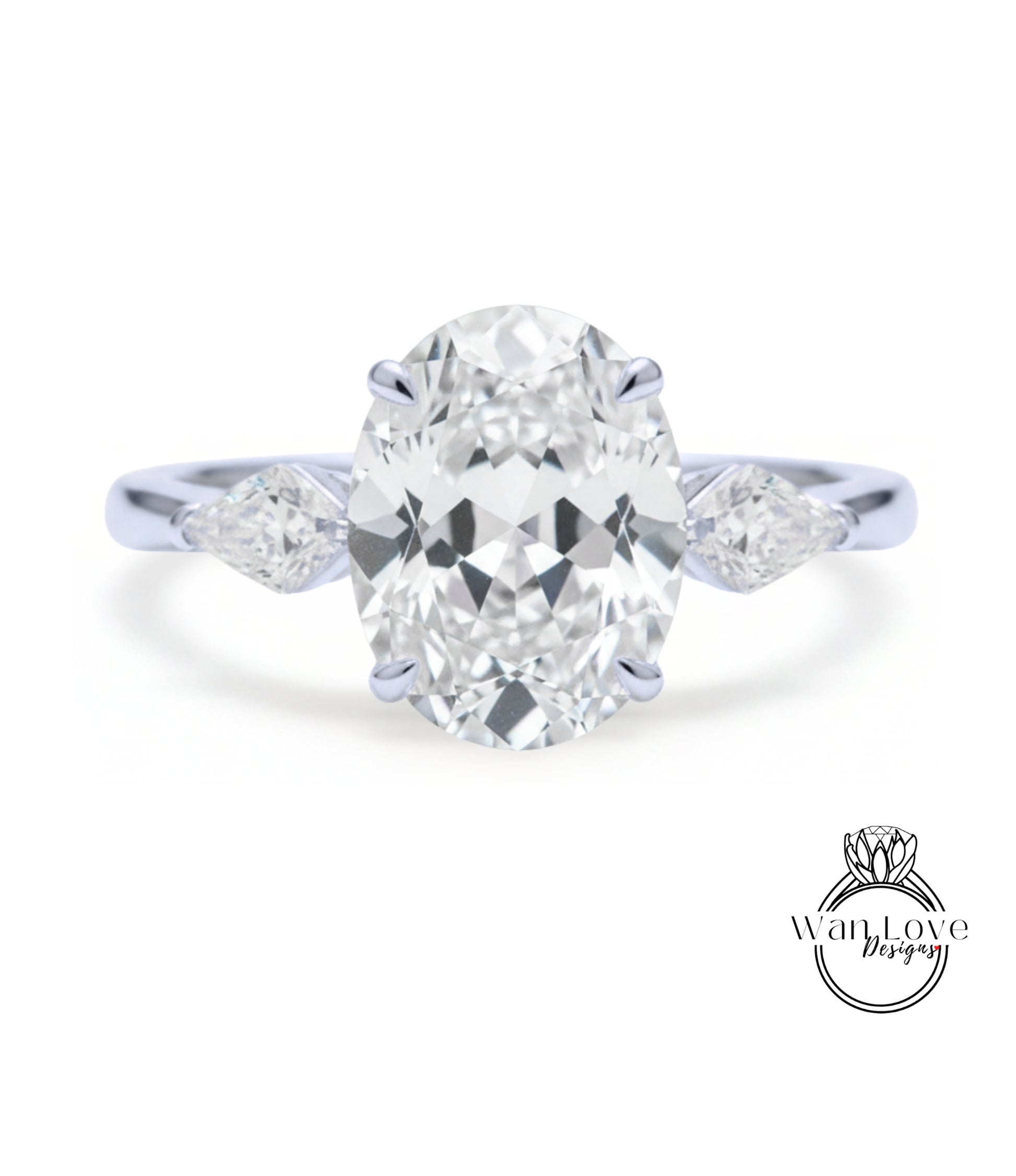 A close-up of a diamond engagement ring with a large oval-shaped diamond set in the center, surrounded by smaller diamonds on either side.