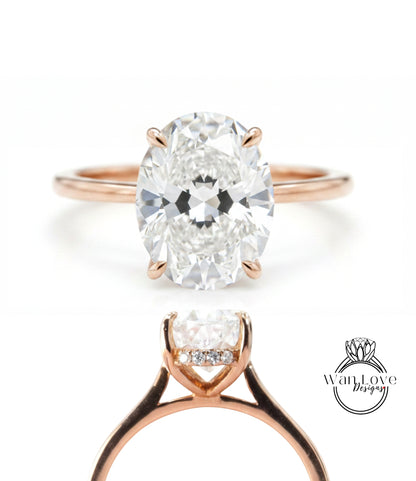 a beautiful diamond engagement ring with a large oval-shaped diamond set in a rose gold band.