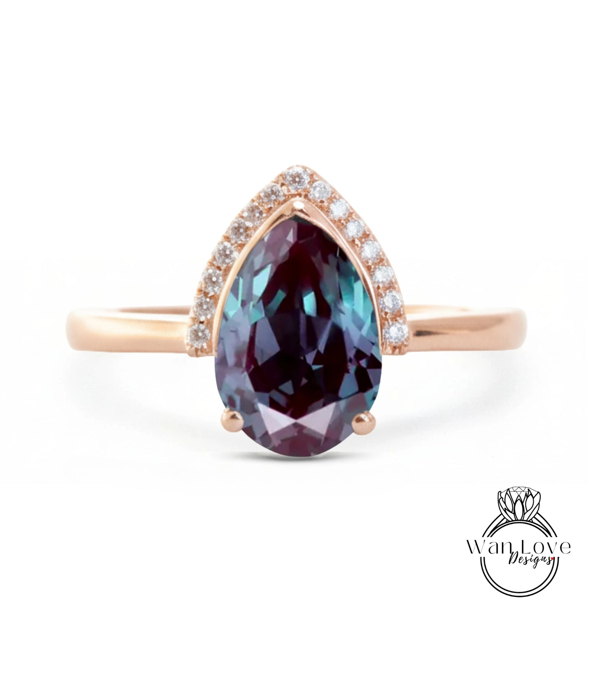 A gold ring with a large, deep purple gemstone set in the center, surrounded by smaller diamonds.