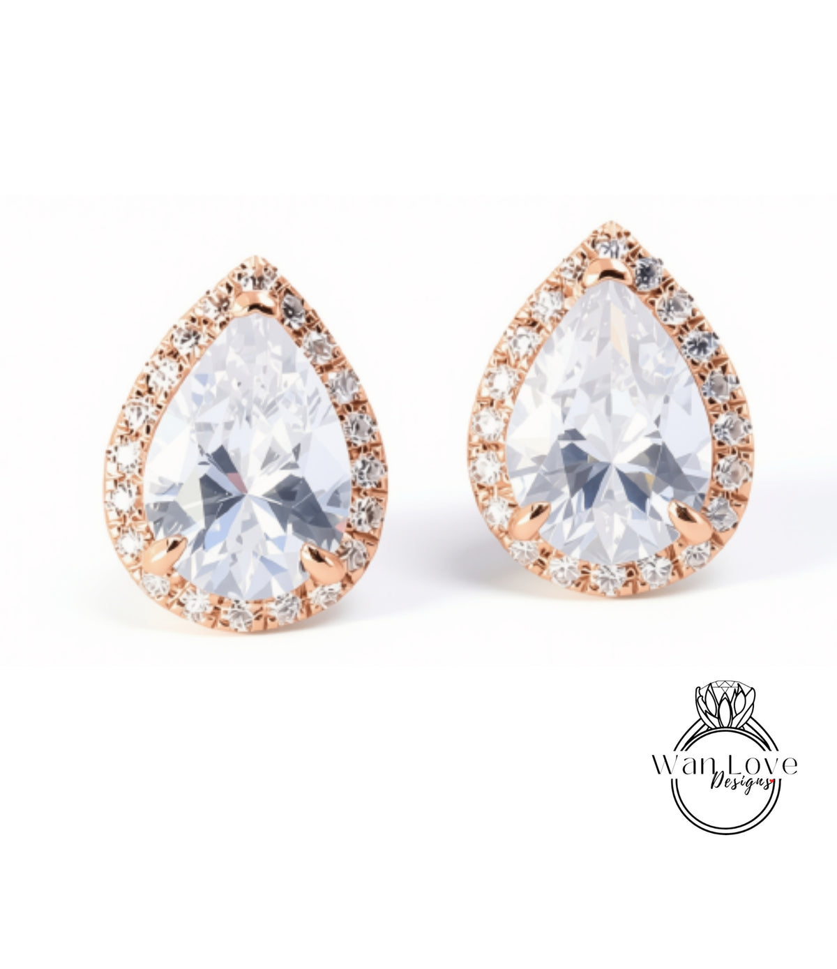 A pair of elegant earrings with large, clear gemstones set in a delicate gold-toned frame.