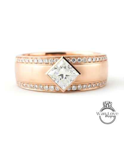 A rose gold ring with a large diamond set in the center, surrounded by smaller diamonds along the band.