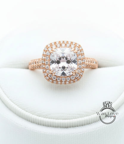A close-up image of a beautiful engagement ring with a large, clear gemstone set in a rose gold band.