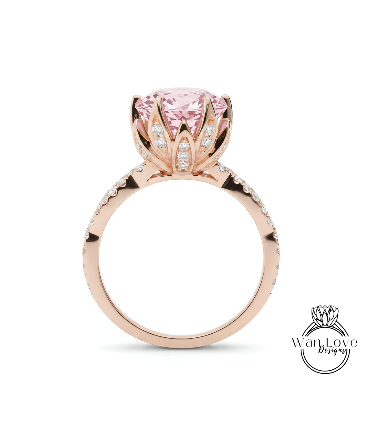 A rose gold ring with a large pink gemstone, likely a diamond, at the center.